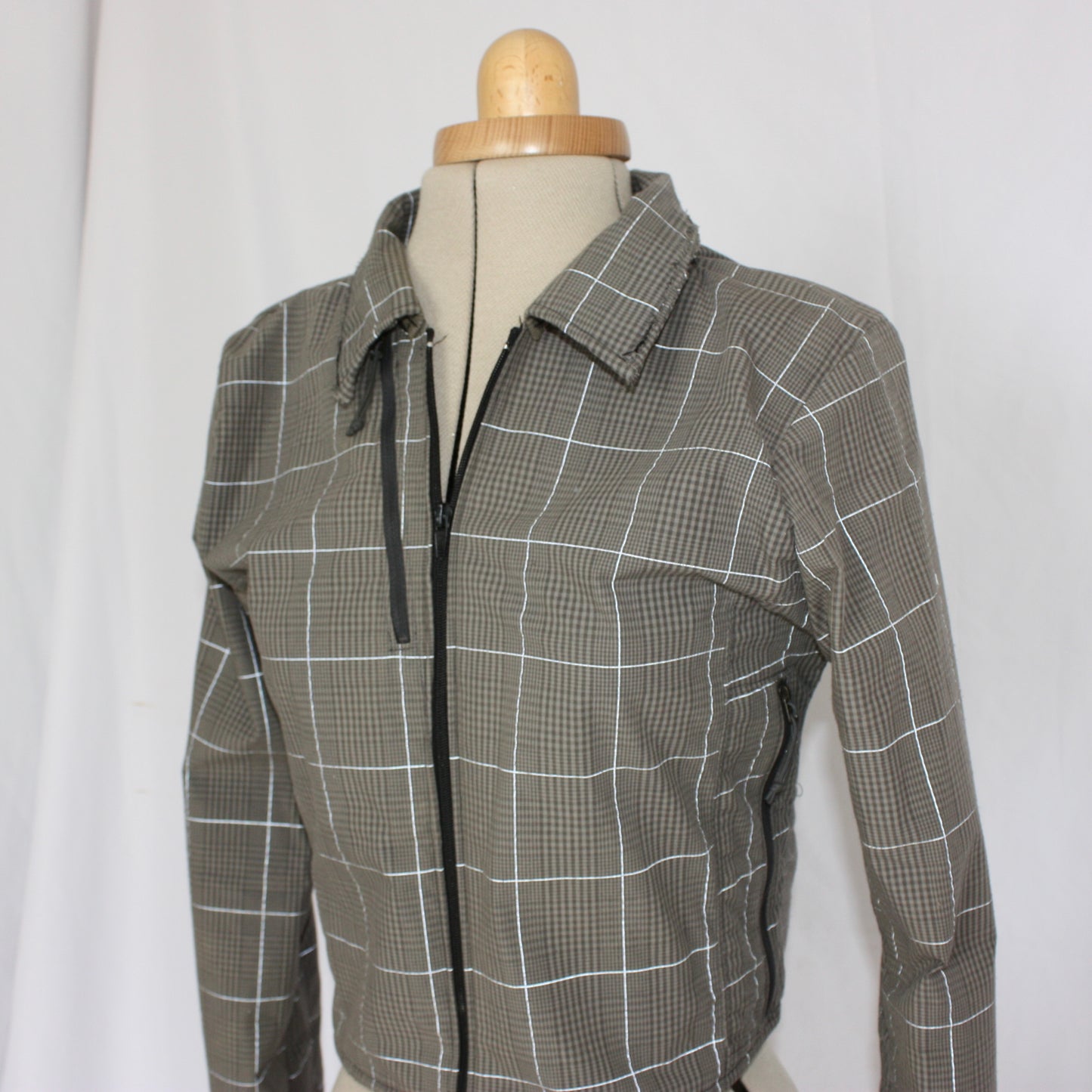 Grey & reflective North Face jacket